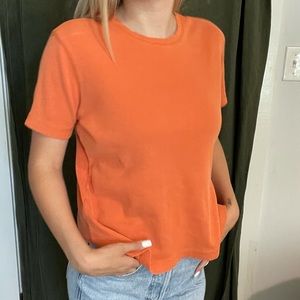 adorable orange t-shirt with a striped design ! size M